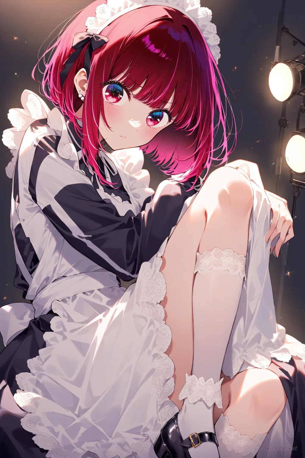 Kana Arima wearing a classic black-and-white Victorian maid dress with frilled apron and white maid headdress, knee-up half-body shot